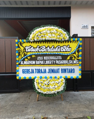 Papan Bunga Duka di Cikalang